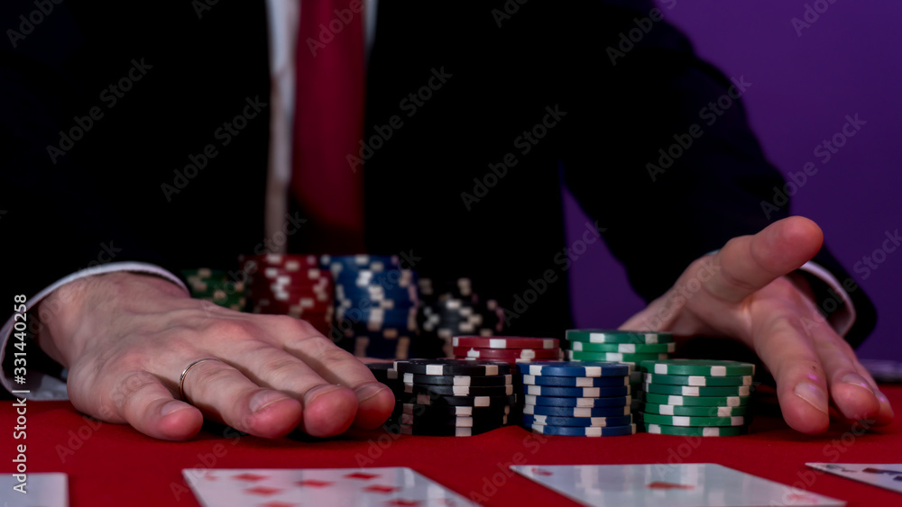 man is sitting at the poker table. poker game. man is sitting at the poker table. poker game.