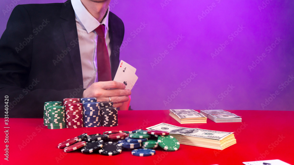 man is sitting at the poker table. poker game. man is sitting at the poker table. poker game.