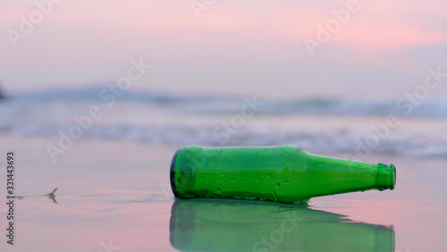 bottle glass on the beach