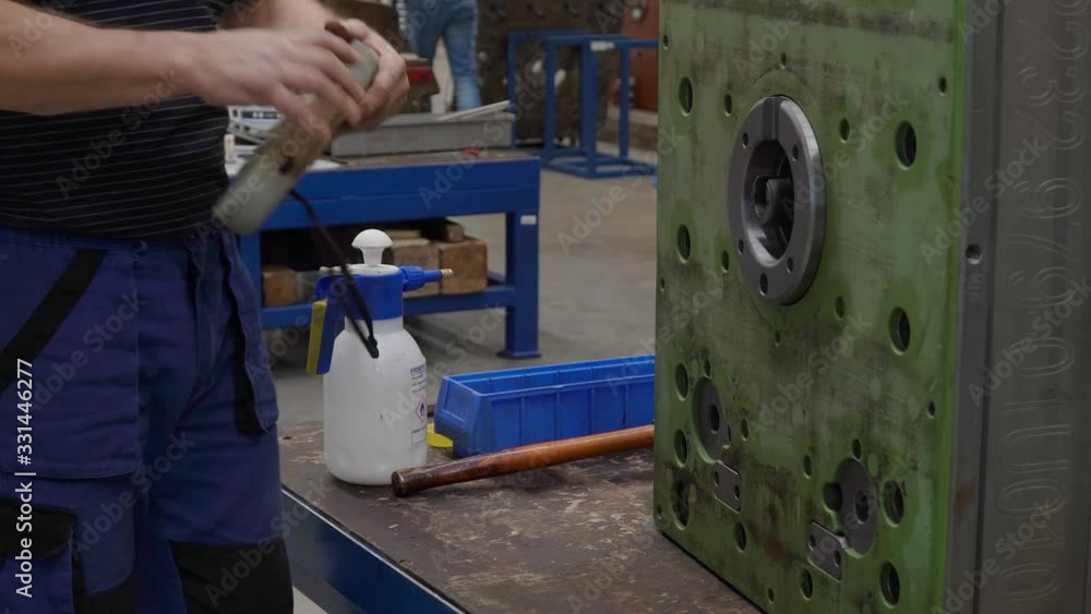 Adjusting the axis in metal mold to plastic castings for the automotive industry with a hammer