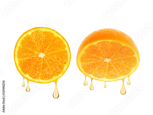 drops of juice falling from orange half isolated on white background