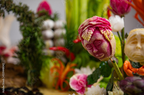 Photography Carving. Raw vegetables cut for decoration. beetroot face