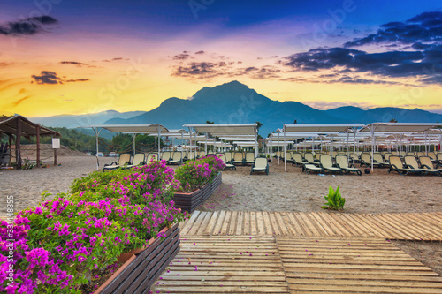 Fototapeta Naklejka Na Ścianę i Meble -  Amazing sunset on the coast of Turkish Riviera with Mount Tahtali in background, Tekirova