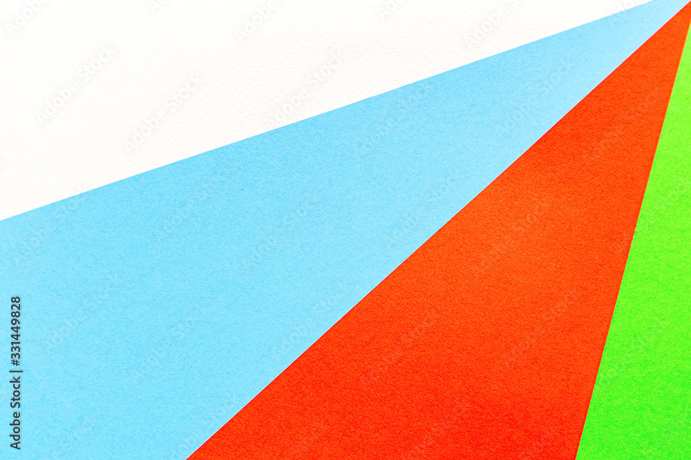 White, blue, red and green color paper texture background. White, blue, red and green color paper texture background.