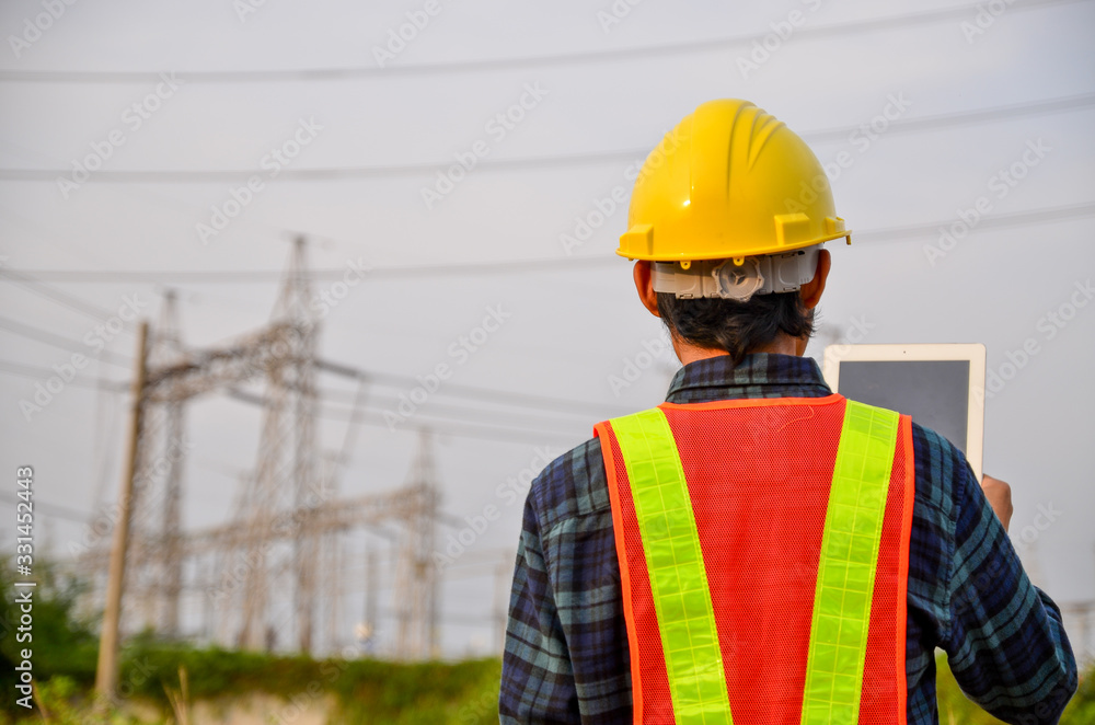 Engineers are using tablets for business communication at work sites. Engineers are using tablets for business communication at work sites.