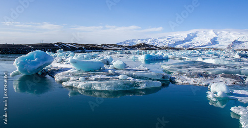 small icebergs and ice floes in the sea near iceland