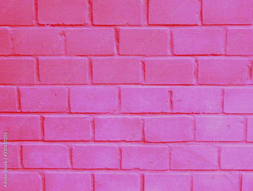 Pink brick wall background close up Pink brick wall background close up