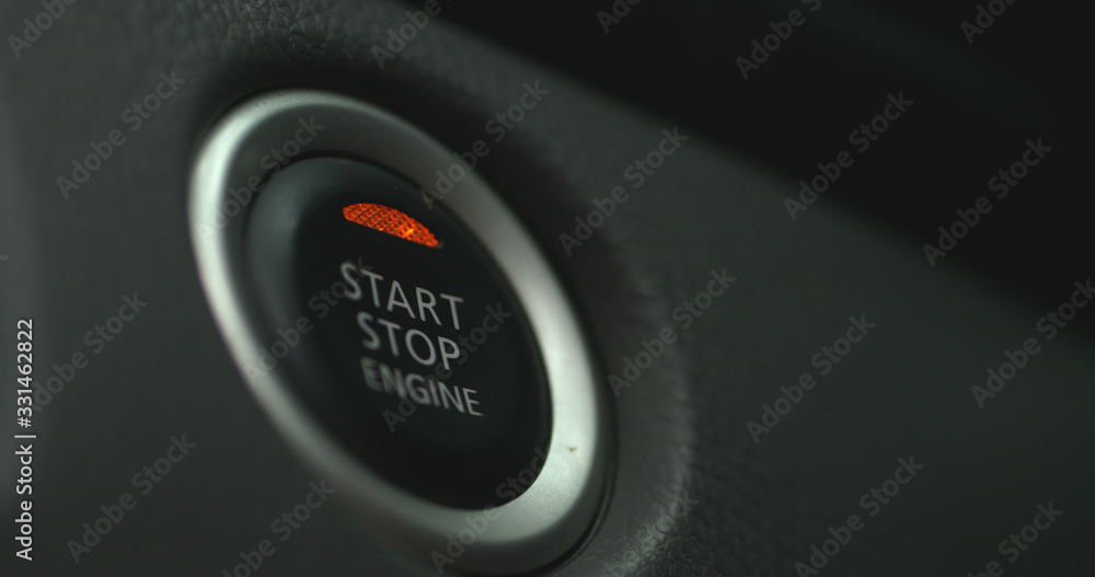 Car ignition button closeup image