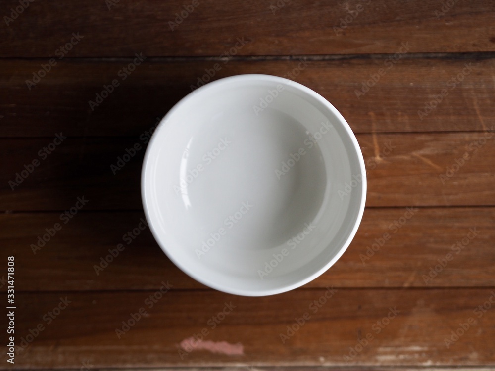 empty cup on wooden table empty cup on wooden table