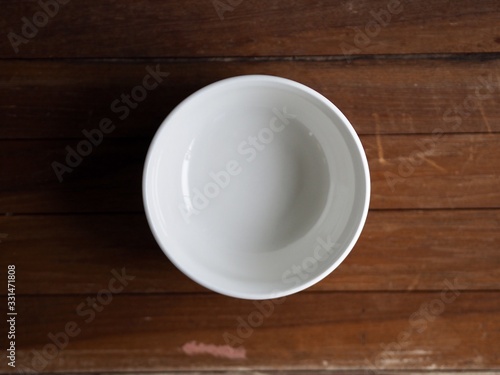 empty cup on wooden table