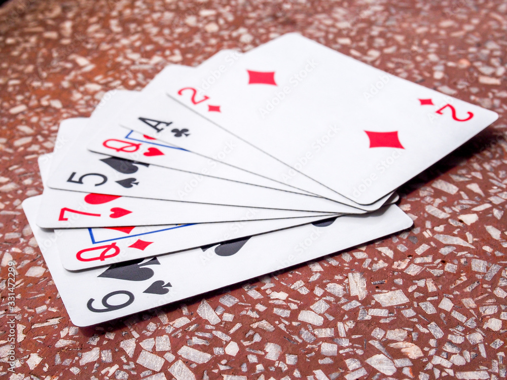 Obraz premium Closeup view of many playing cards forming the poker