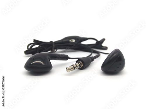 Earphones for mobile phone isolated on white background. Black earbud for smartphone.