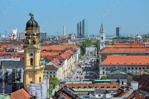 Munich, Germany. View from tower of New Town Hall over the Ludwigstrasse avenue with tower of Theatinerkirche, tower of Ludwigskirche, Siegestor triumphal arch, and northern part of the city.