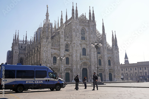 Europe, Italy Milan march 2020 - Duomo Cathedral, Vittorio Emanuele Gallery  empty of people and tourist, n-cov19 Coronavirus epidemic - checkpoints, police checks    photo