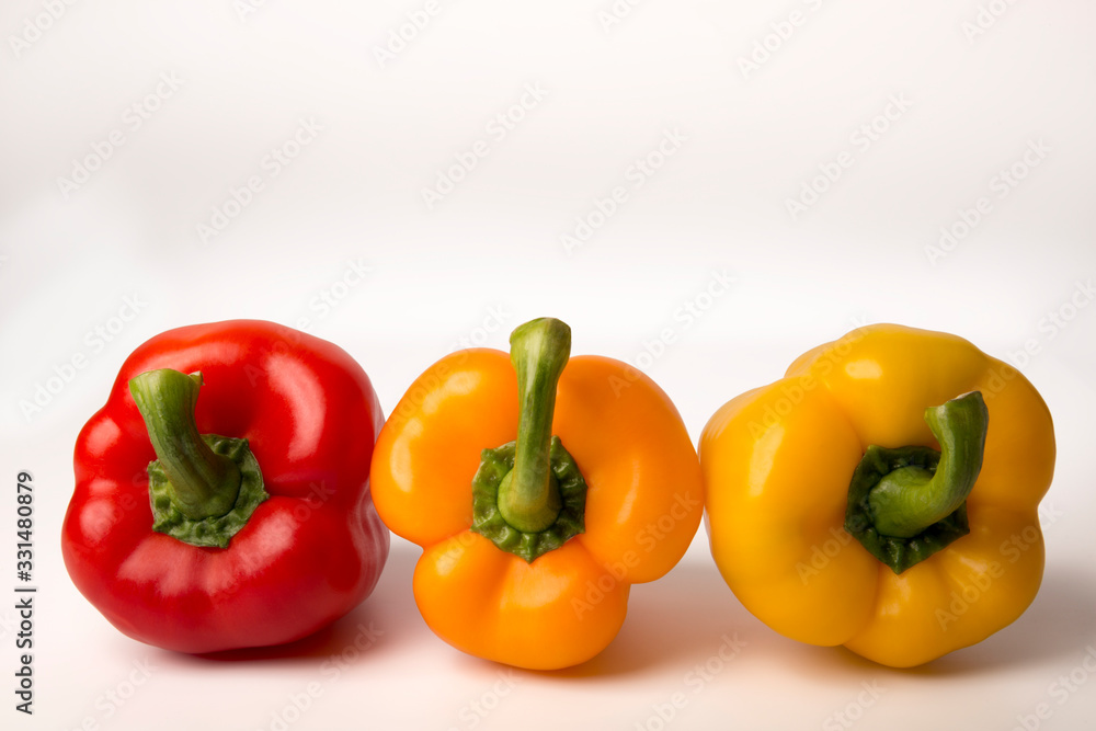 colorful bell peppers isolated on white background colorful bell peppers isolated on white background