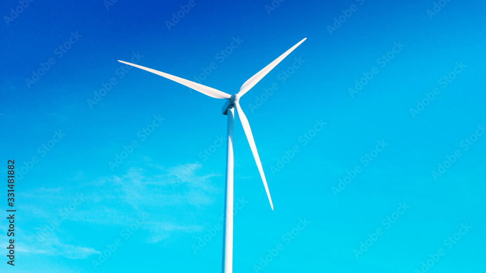 Wind energy wind turbines and blue sky Wind energy wind turbines and blue sky