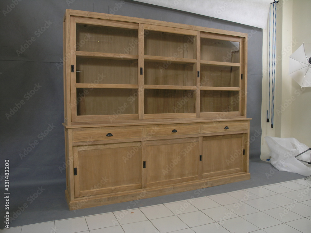 Fototapeta premium Classy and Modern Luxury Wooden Storage Furniture for Home Interiors Furniture in Factory Isolated Background