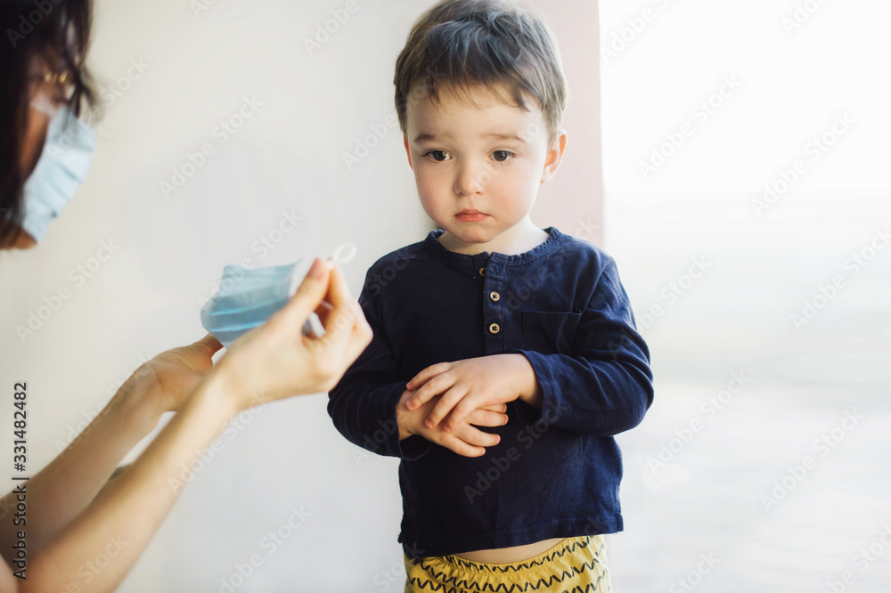 Coronavirus quarantine. Kids stay at home, Distance learning online education. Social isolation. Medical masks. Coronavirus quarantine. Kids stay at home, Distance learning online education. Social isolation. Medical masks.