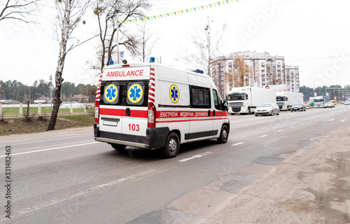 Ukrainian ambulance on emergency car in motion blur