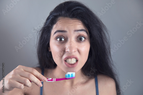 Woman Brush your teeth with a toothbrush