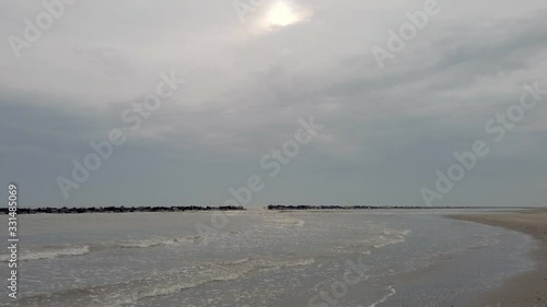 walking on seaside in a cold winter day