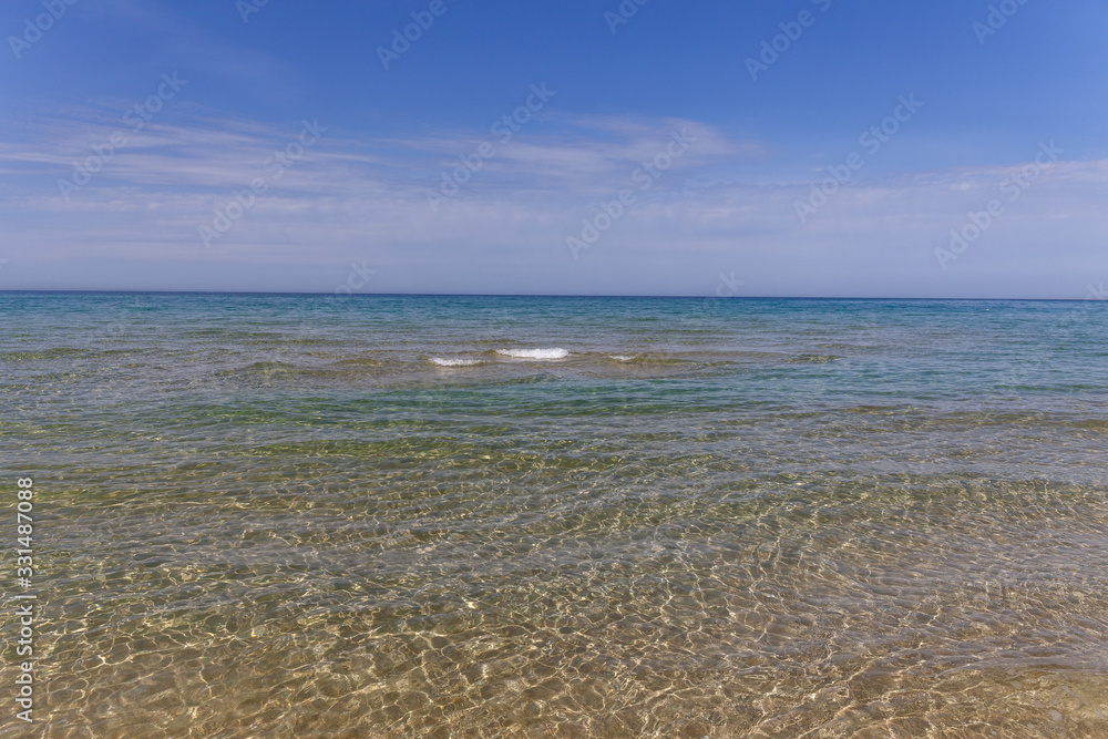 Caspian Sea. Clear sea water. The sea is blue with small waves. selective focus Caspian Sea. Clear sea water. The sea is blue with small waves. selective focus