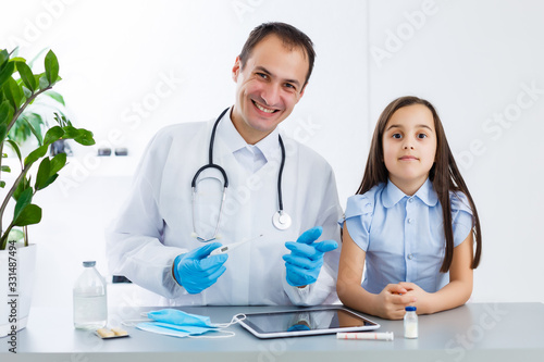 doctor and little girl patient in the clinic, consultation