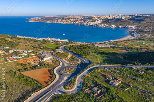 Aerial landscape view of roundabout, bay, beach and Mediterranean sea. Mellieha city. Europe. Malta island © Karina Movsesyan