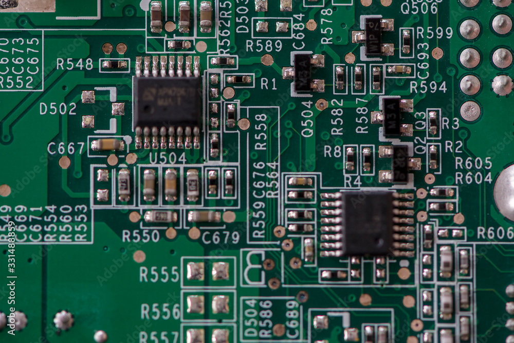 Close-up of electronic components. SMD resistors, capacitors and integrated circuits. Close-up of electronic components. SMD resistors, capacitors and integrated circuits.