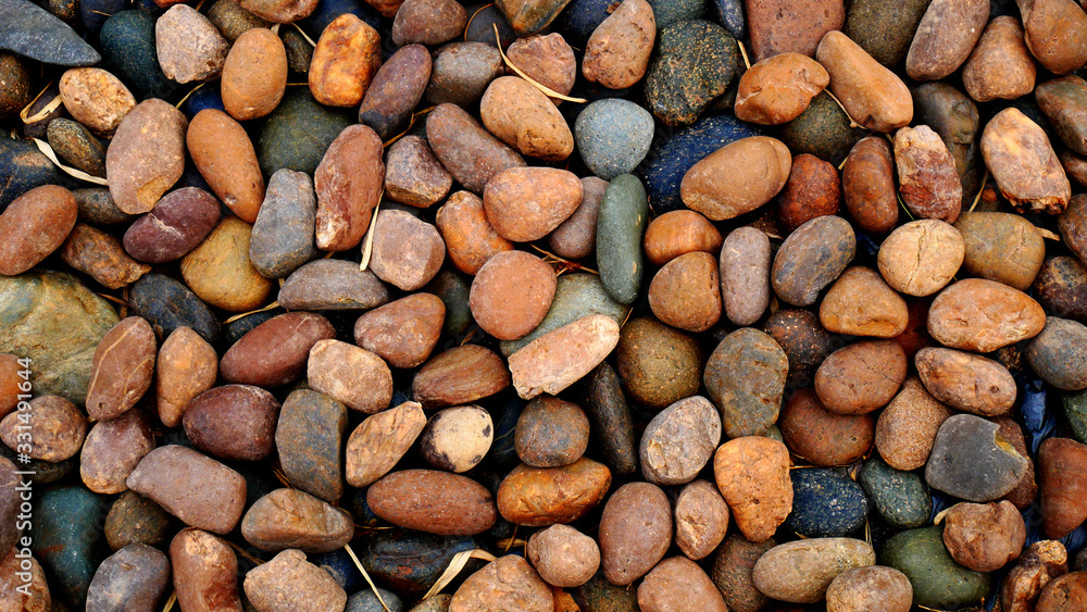 background of brown stones. pebble beach stone background of brown stones. pebble beach stone