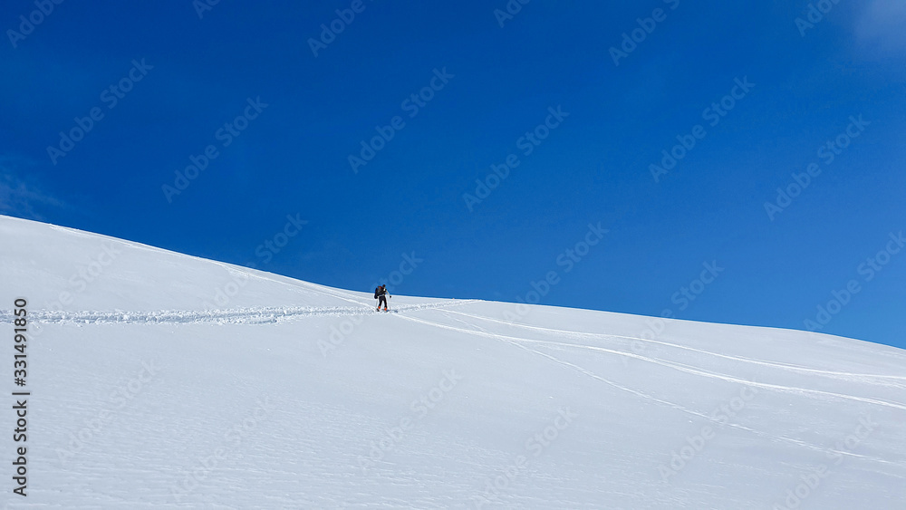 skitouring in the mountains snow winter