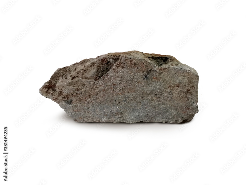 Obraz premium Tuff rock specimen on white background. Tuff is igneous rock that contains the debris from an explosive volcanic eruption.