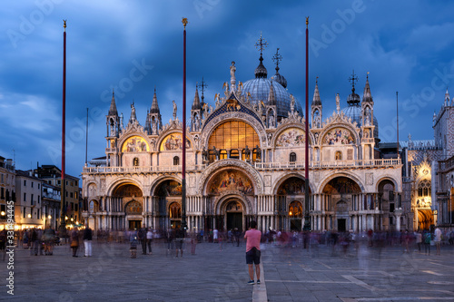 Scenic evening view of St Marks cathedral from the piazza of San Marco photo