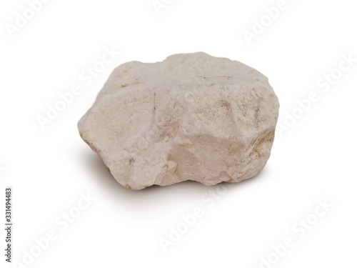 A specimen of diatomite isolated on white background. Diatomaceous earth or diatomite is a light-colored sedimentary rock composed chiefly of siliceous shells of diatoms.