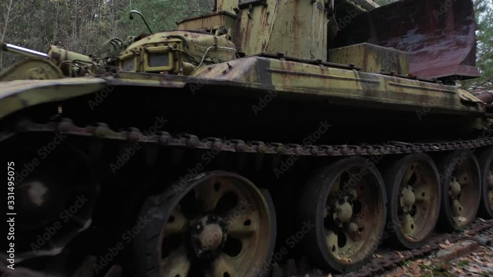 An abandoned tank in the city of Pripyat in the Chernobyl exclusion zone. Graveyard of technology. An abandoned tank in the city of Pripyat in the Chernobyl exclusion zone. Graveyard of technology.