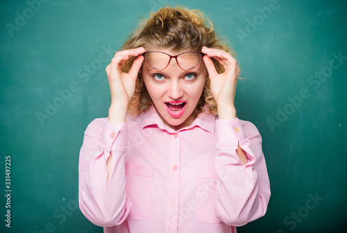 here you are. back to school. empty blackboard. new school year. Girl prepare for exams. girl teacher at school lesson. Formal informal and nonformal education. happy student in glasses at blackboard photo