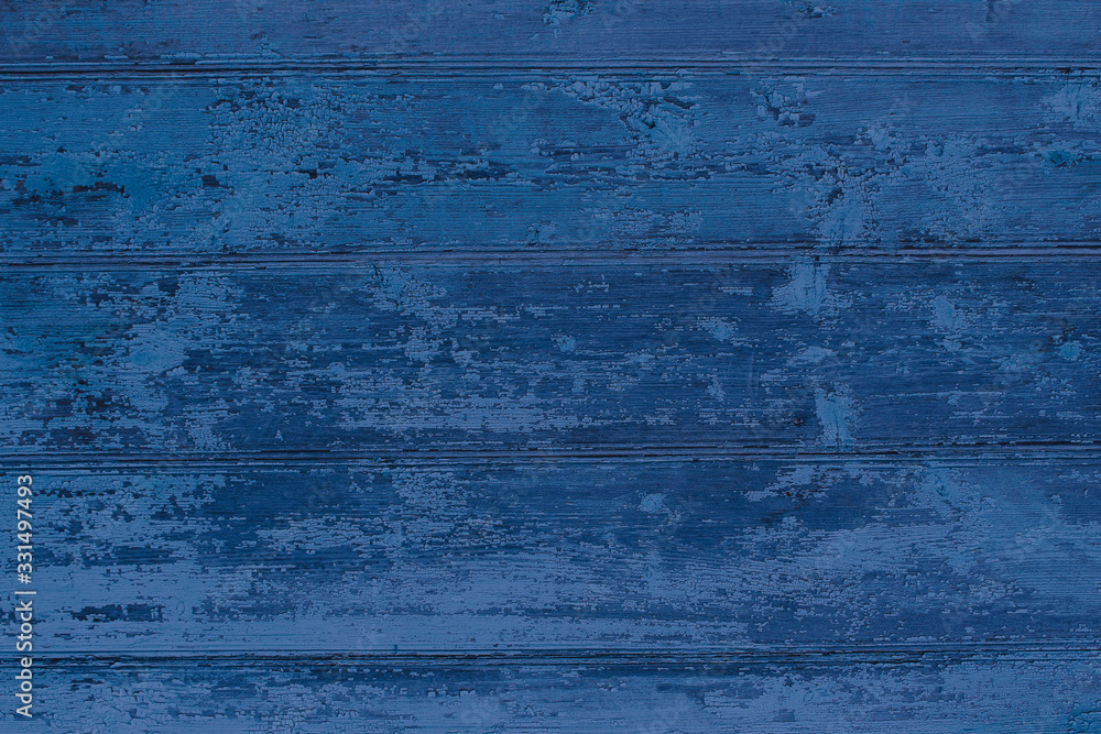 Old wooden painted dark blue boards. Horizontal view. Background. Texture.