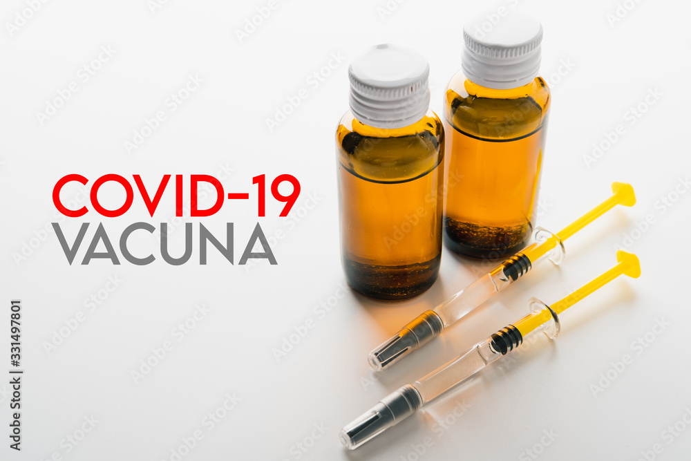 Coronavirus Vaccine, Corona virus Vaccine concept with syringe and.antidote on white background. Vaccine Concept of fight against coronavirus. Coronavirus Vaccine, Corona virus Vaccine concept with syringe and.antidote on white background. Vaccine Concept of fight against coronavirus.