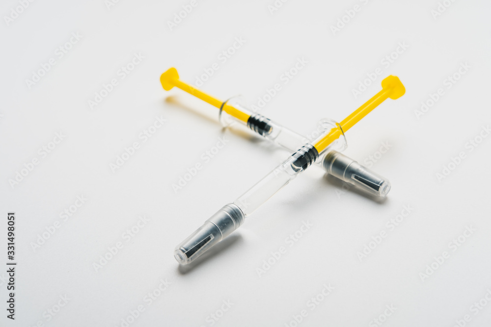 Coronavirus Vaccine, Corona virus Vaccine concept with syringe and.antidote on white background. Vaccine Concept of fight against coronavirus. Coronavirus Vaccine, Corona virus Vaccine concept with syringe and.antidote on white background. Vaccine Concept of fight against coronavirus.