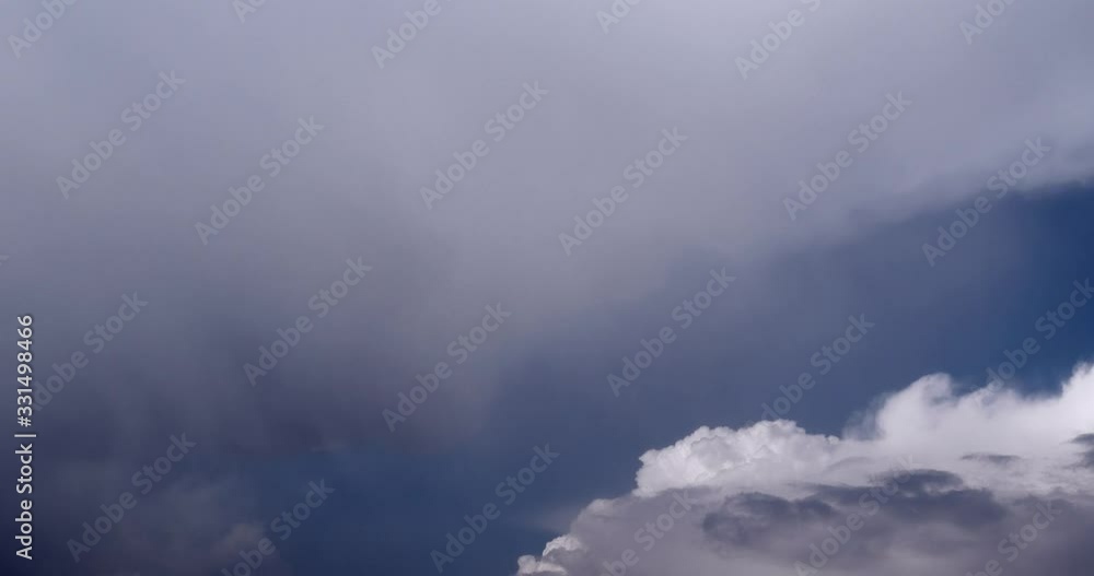 From White Clouds To Dark Overcast. Heavy Rainy Cloud Covers Blue Sky Time-lapse From White Clouds To Dark Overcast. Heavy Rainy Cloud Covers Blue Sky Time-lapse