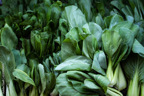 A bunch of bok choy in a supermarket