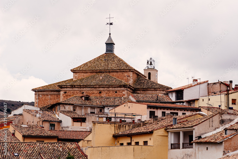 View of the medieval town of Pastrana with tile roofs and traditional houses.  La Alcarria, Guadalajara, Spain
