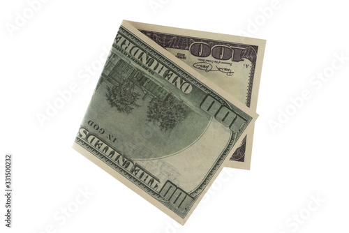 Folded in half 100 dollars. Isolated on a white background.