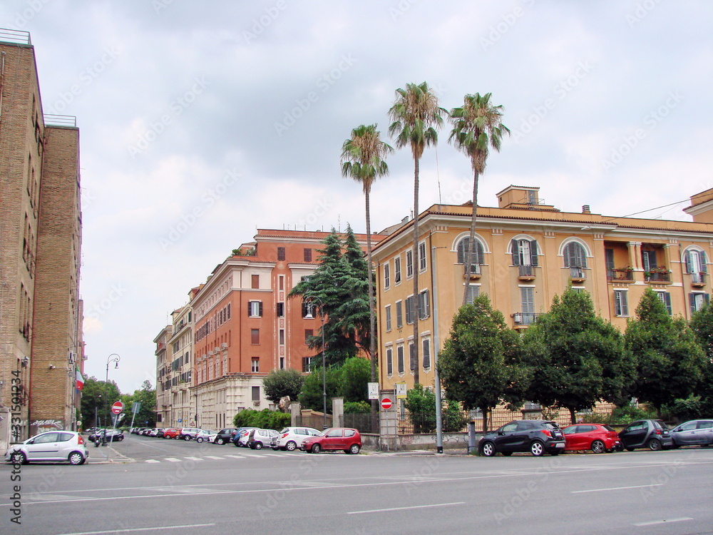 Naklejka premium Cityscape of the outskirts of Rome on a background of cloudy summer sky.