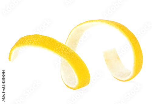 Citrus twist peel isolated on a white background. Lemon peel. Lemon skin.
