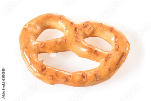 Pretzel, mini snack with salt for beer. Savory backed beer snack. Macro close-up isolated on white background