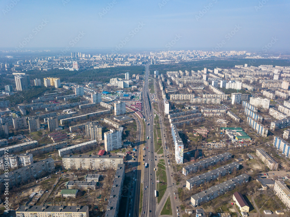 Fototapeta premium Drone view of Kyiv city at sunny weather.