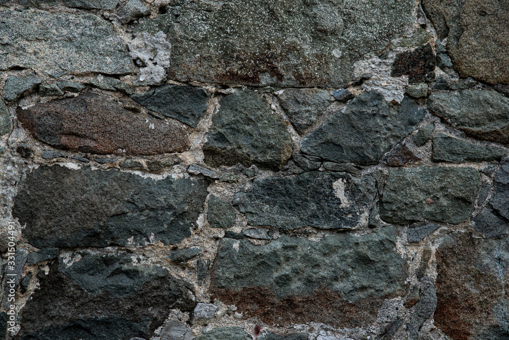 Texture of stone wall made of grey stones Texture of stone wall made of grey stones