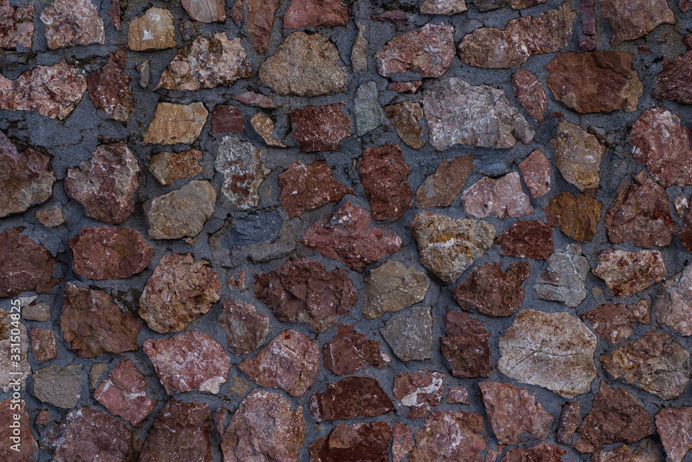 Texture of stone wall made of grey stones Texture of stone wall made of grey stones