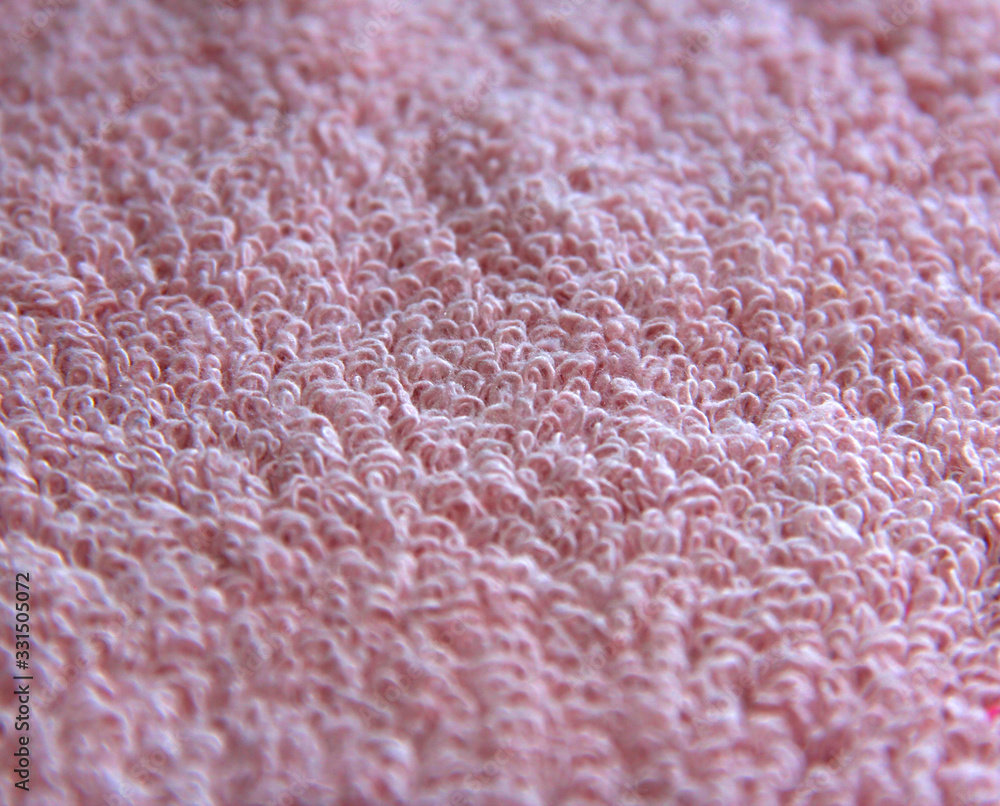 Texture of a pink towel. Bath towel loops. Texture of a pink towel. Bath towel loops.